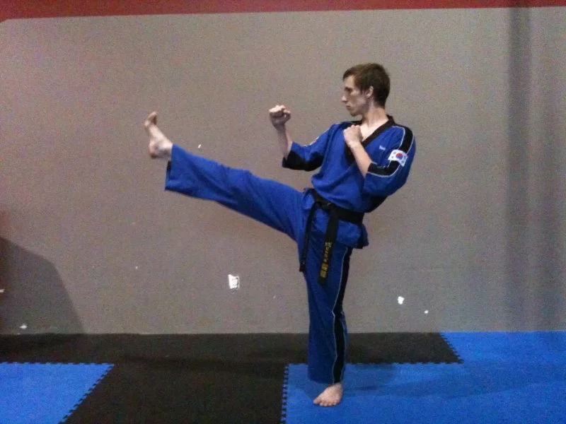 How to Execute a Sliding Front Kick for Closing Distance in Martial Arts
