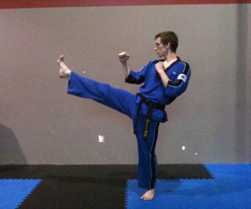 How to Execute a Sliding Front Kick for Closing Distance in Martial Arts