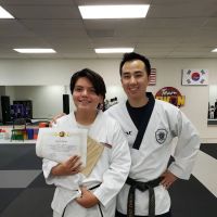 Team Kwon Taekwondo Center - Orange ico