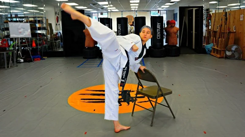 How to Execute a Jumping Spin Hook Kick for Advanced Breaking