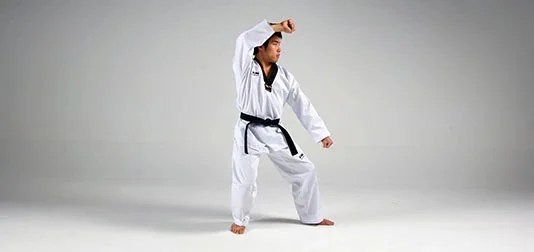 How to Perform a Rising Block (Chookyo Makgi) Against a Downward Strike