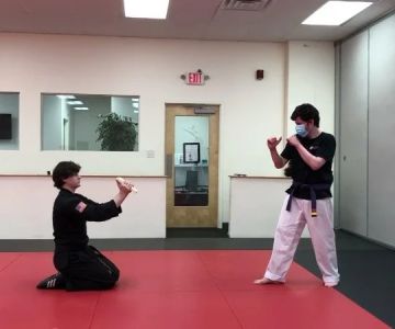 How to Improve Your Axe Kick Technique for Breaking Boards and Head Level Targets