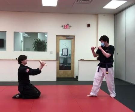 How to Improve Your Axe Kick Technique for Breaking Boards and Head Level Targets